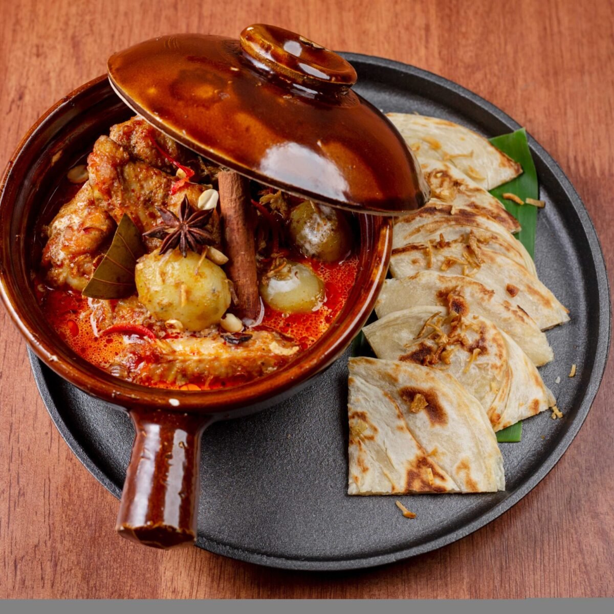 COOKED IN THE CLAY POT